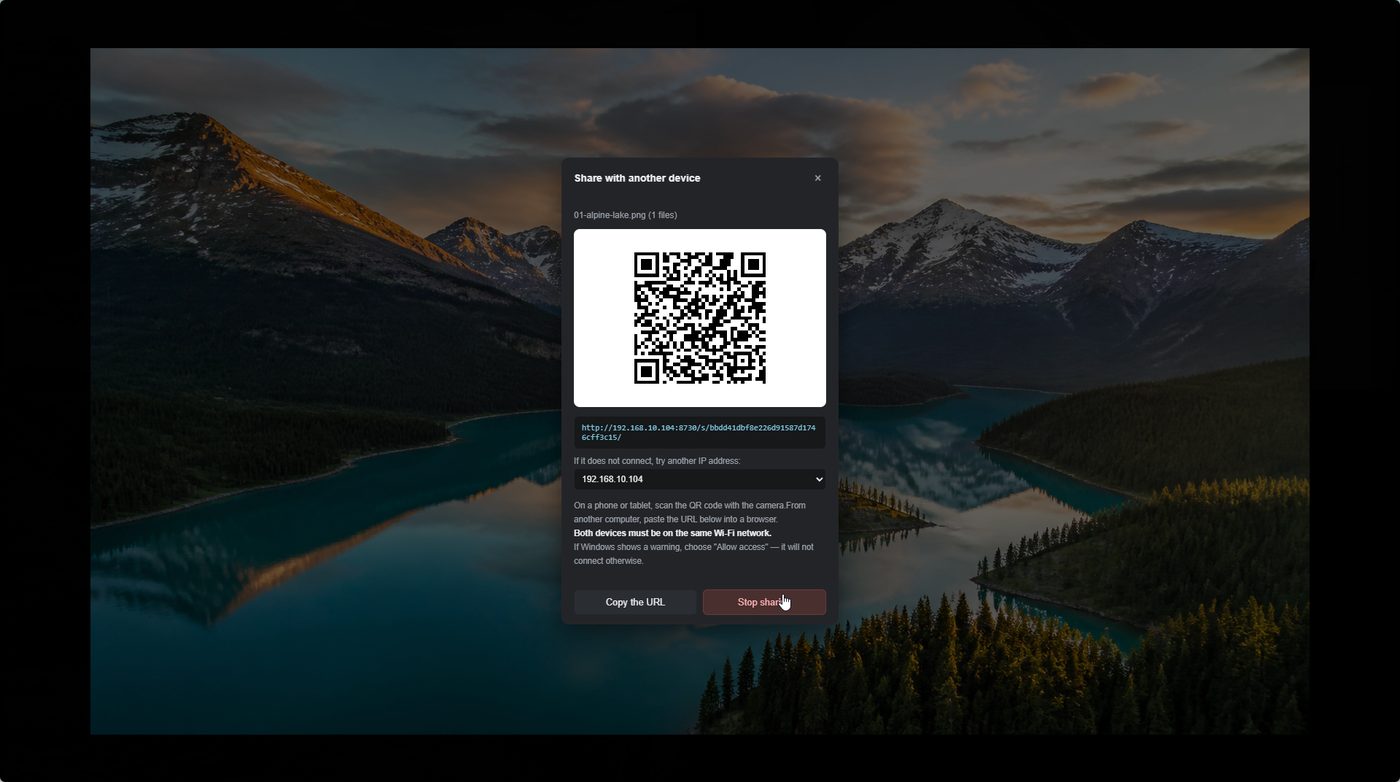 A QR code being used to share with another device